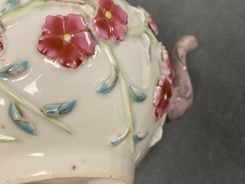 A pair of Chinese famille rose relief-decorated teapots with floral design, Yongzheng